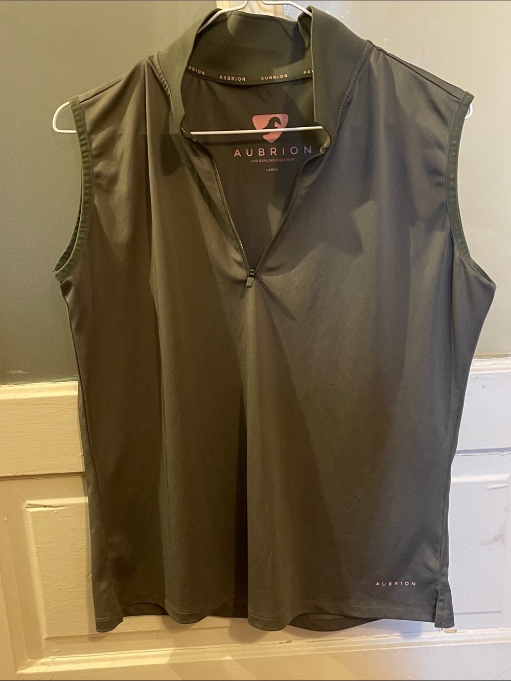 Shire’s Aubrion Sleeveless equestrian tech shirt olive
